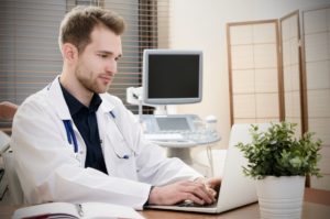 health-care-doctor-working-with-computer (1)