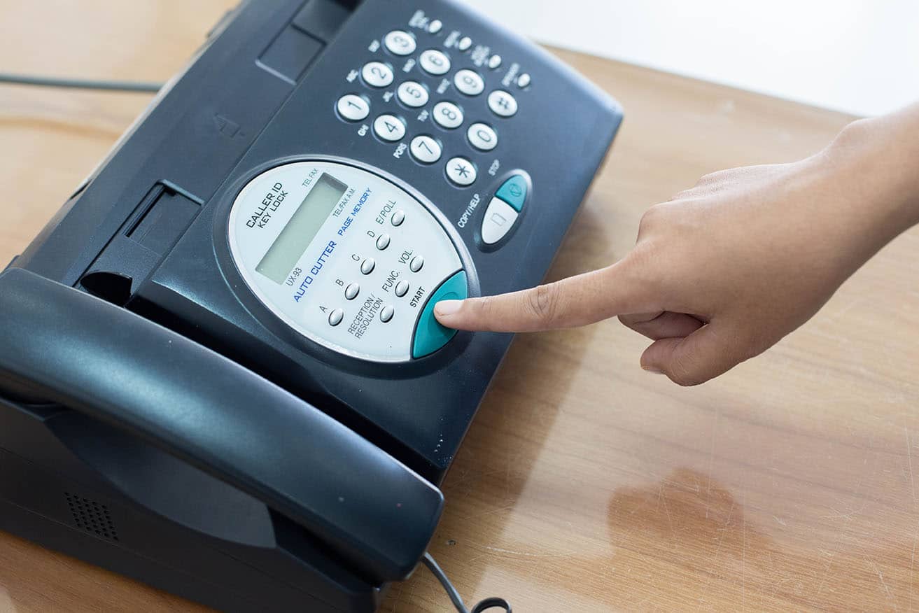 Office,Fax,Machine,With,A,Business,Woman,With,Print,Copy