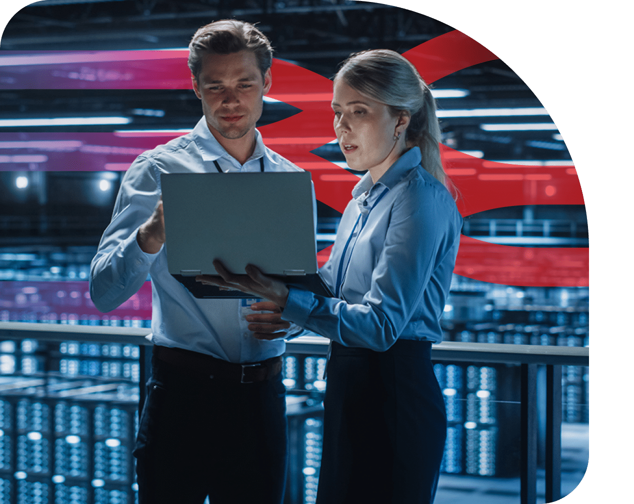 Technical customer support specialist showing and assisting industry professional with laptop computer.