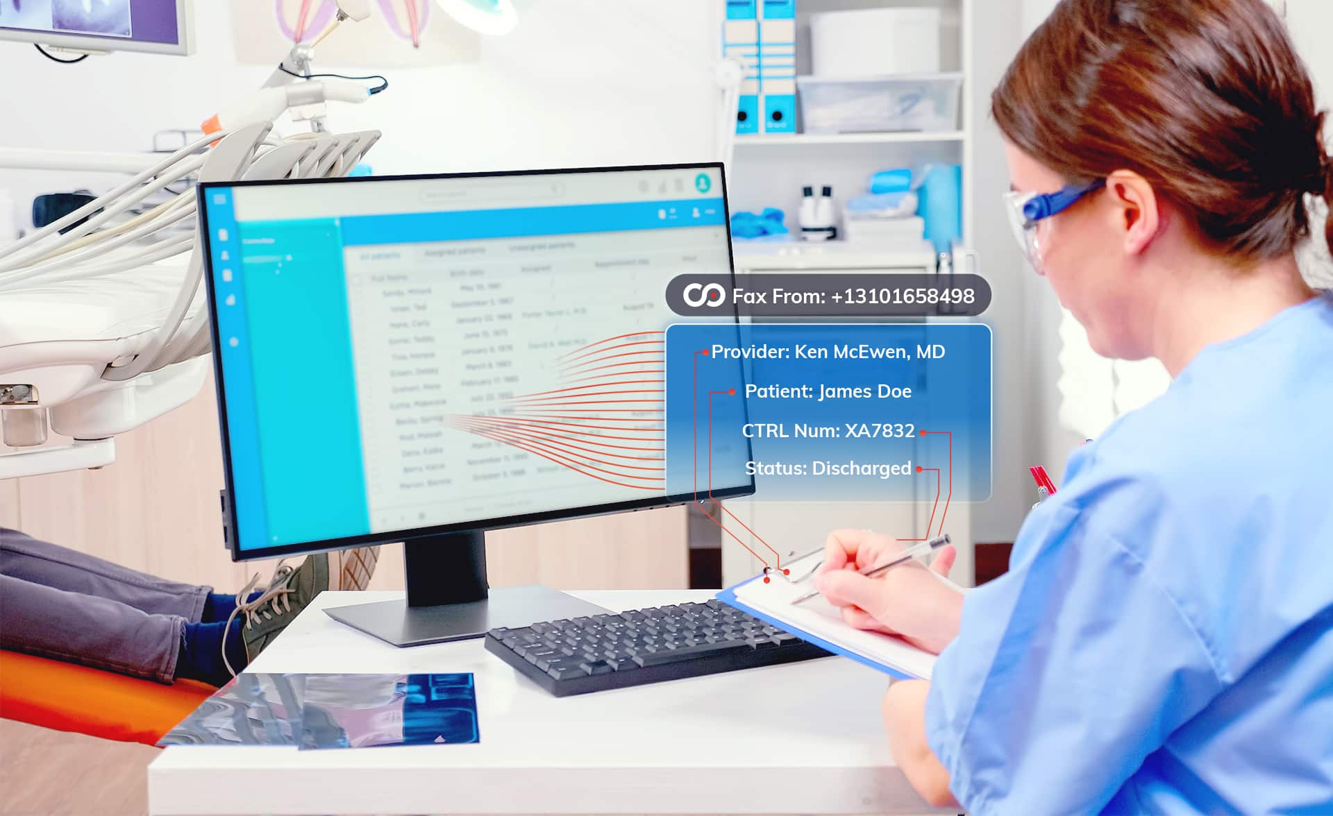 A healthcare worker in scrubs taking notes in front of a computer monitor that displays a digital overlay extracting fax data into fields.