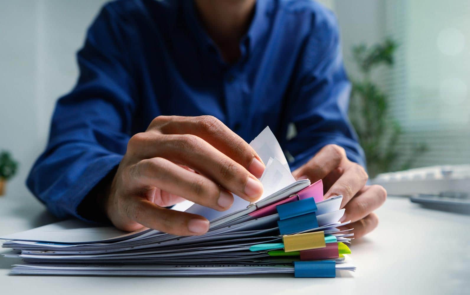 Photo showing manual document sorting